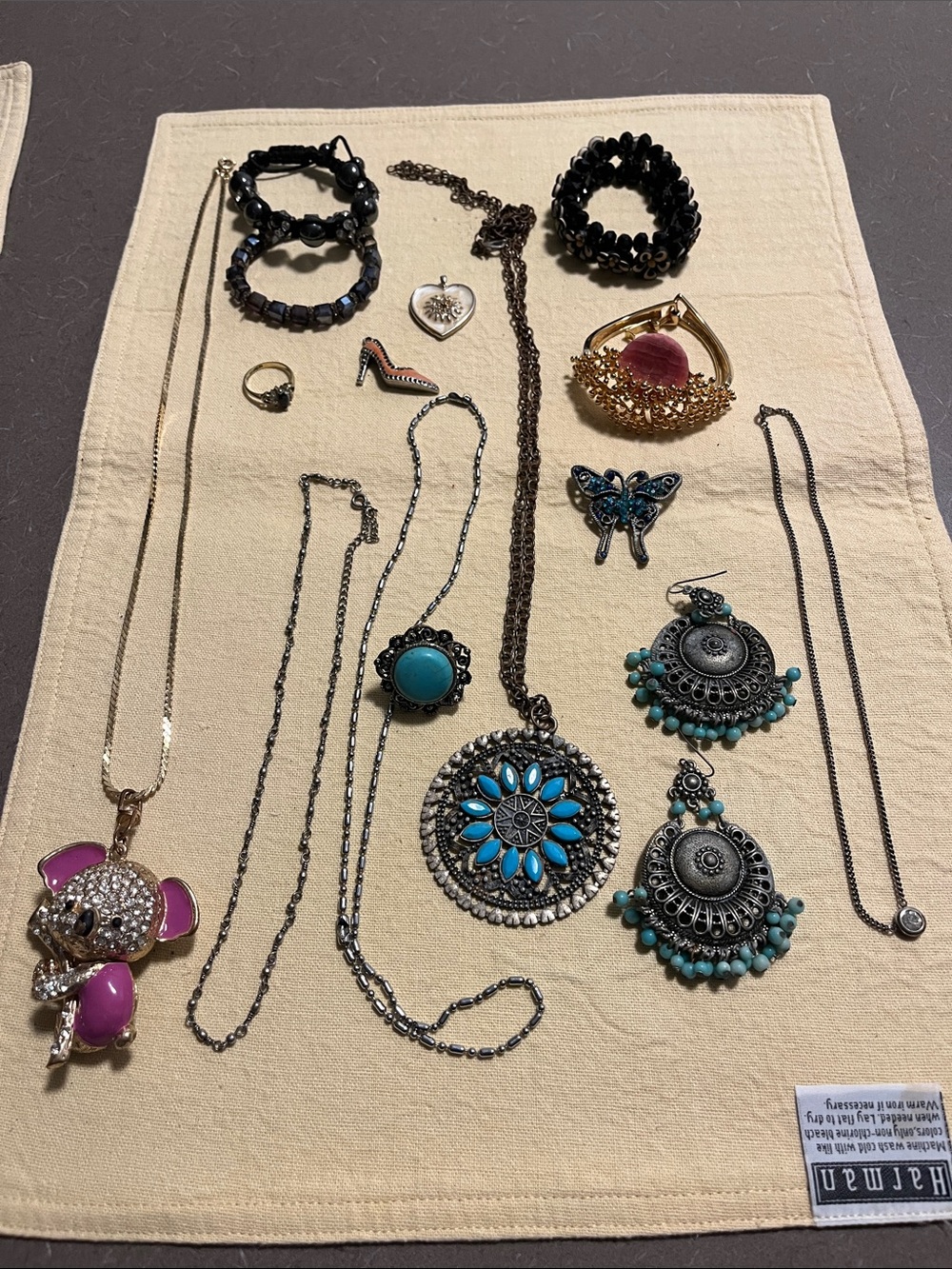 Misc jewelry lot- rings, pendants, necklaces, chains, bracelets and pin